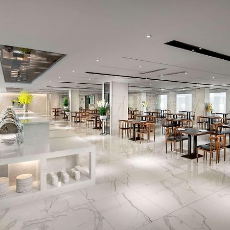 Ramada By Wyndham Mengzi Suites Екстер'єр фото