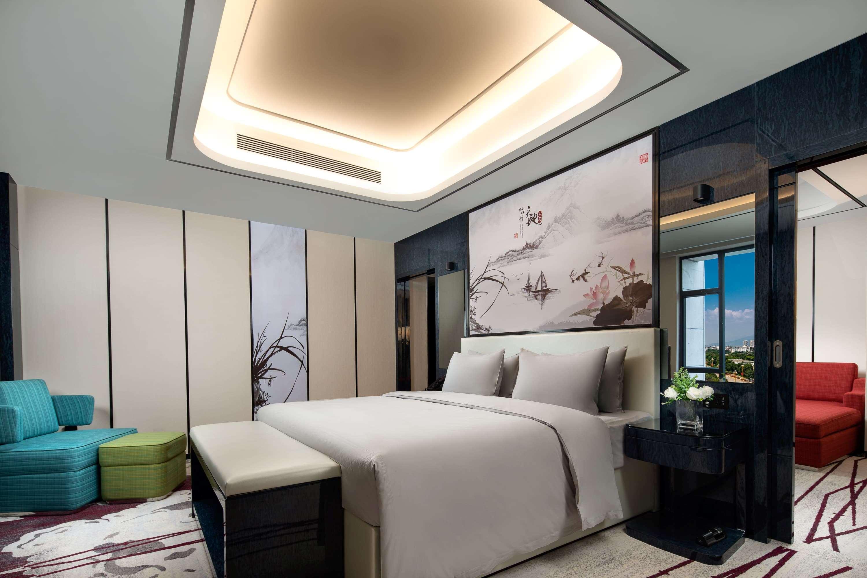 Ramada By Wyndham Mengzi Suites Екстер'єр фото